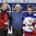 PLYMOUTH, MICHIGAN - APRIL 3: Nike's Kent Angus presents the Player of the Game awards to Canada's Haley Irwin #21 and Russia's Yelena Dergachyova #59 after Canada's 8-0 preliminary round win at the 2017 IIHF Ice Hockey Women's World Championship. (Photo by Matt Zambonin/HHOF-IIHF Images)

